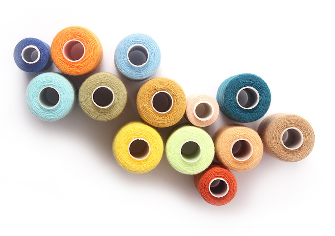 Collection of colored threads with 100% ecological recycled materials